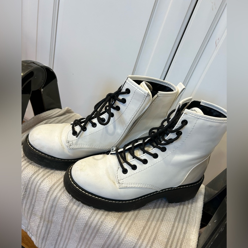 Gently worn white lace up boots
